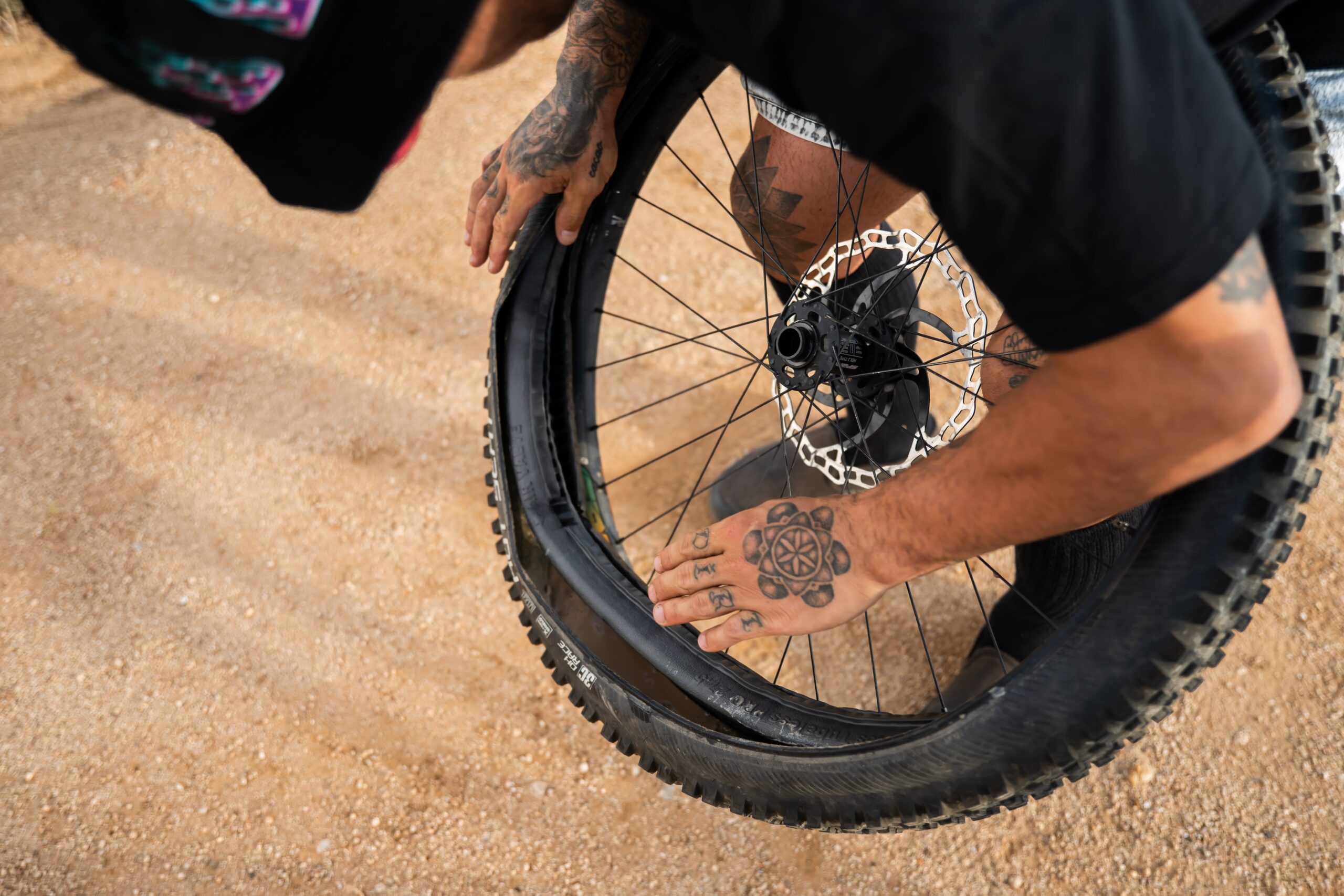 Tannus Tubeless Fusion anti-puncture insert for e-bikes being installed on a tire by freerider Bienvenido Aguado
