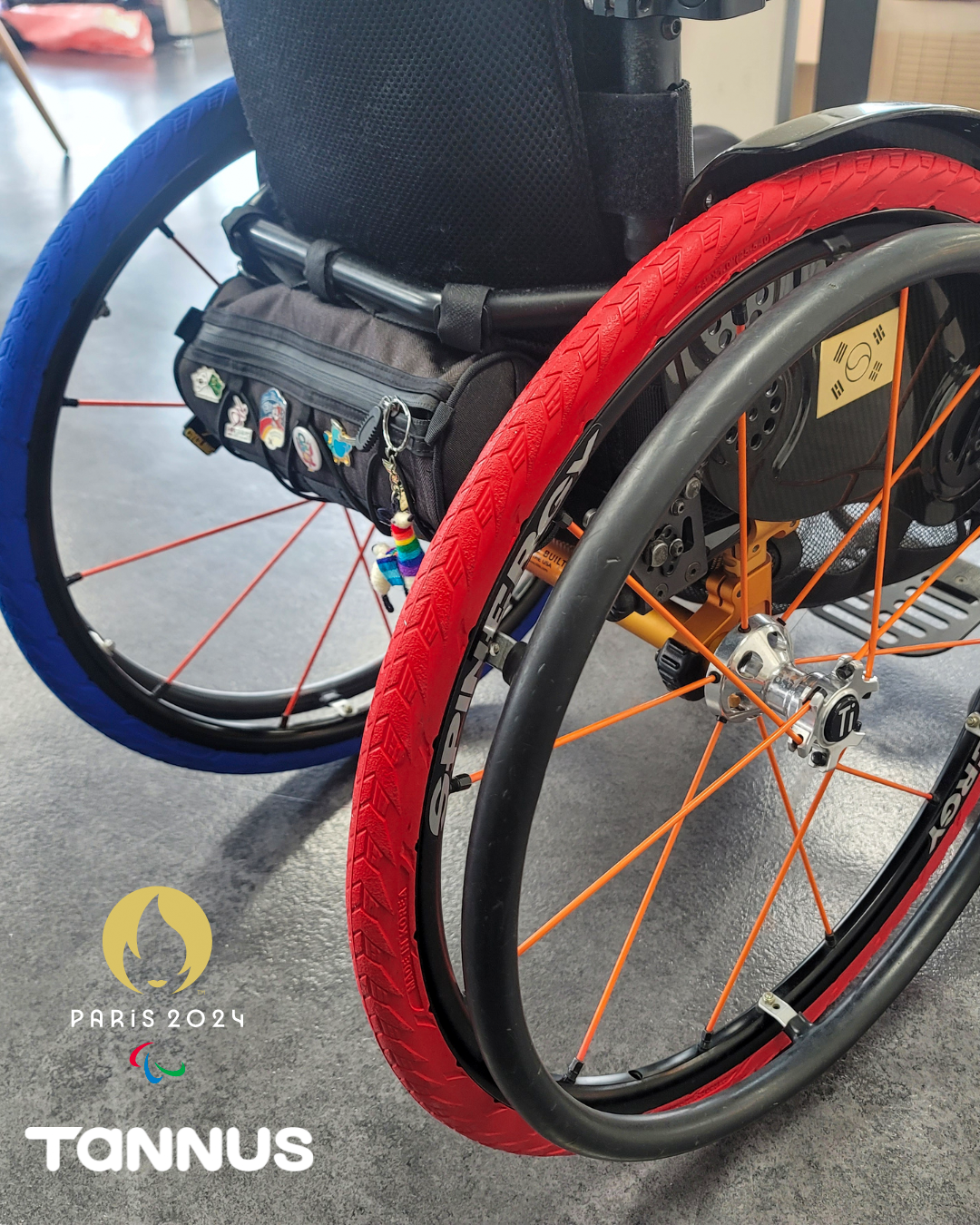 Tannus wheelchair wheels, red and blue, for the Korean national Paralympic team.