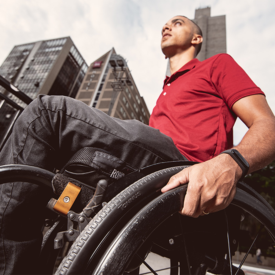 Man with puncture-proof wheelchair Tannus weelchair